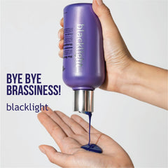 OLIGO PROFESSIONNEL Blacklight Blue Shampoo bottle back with 11 amino acids highlight.