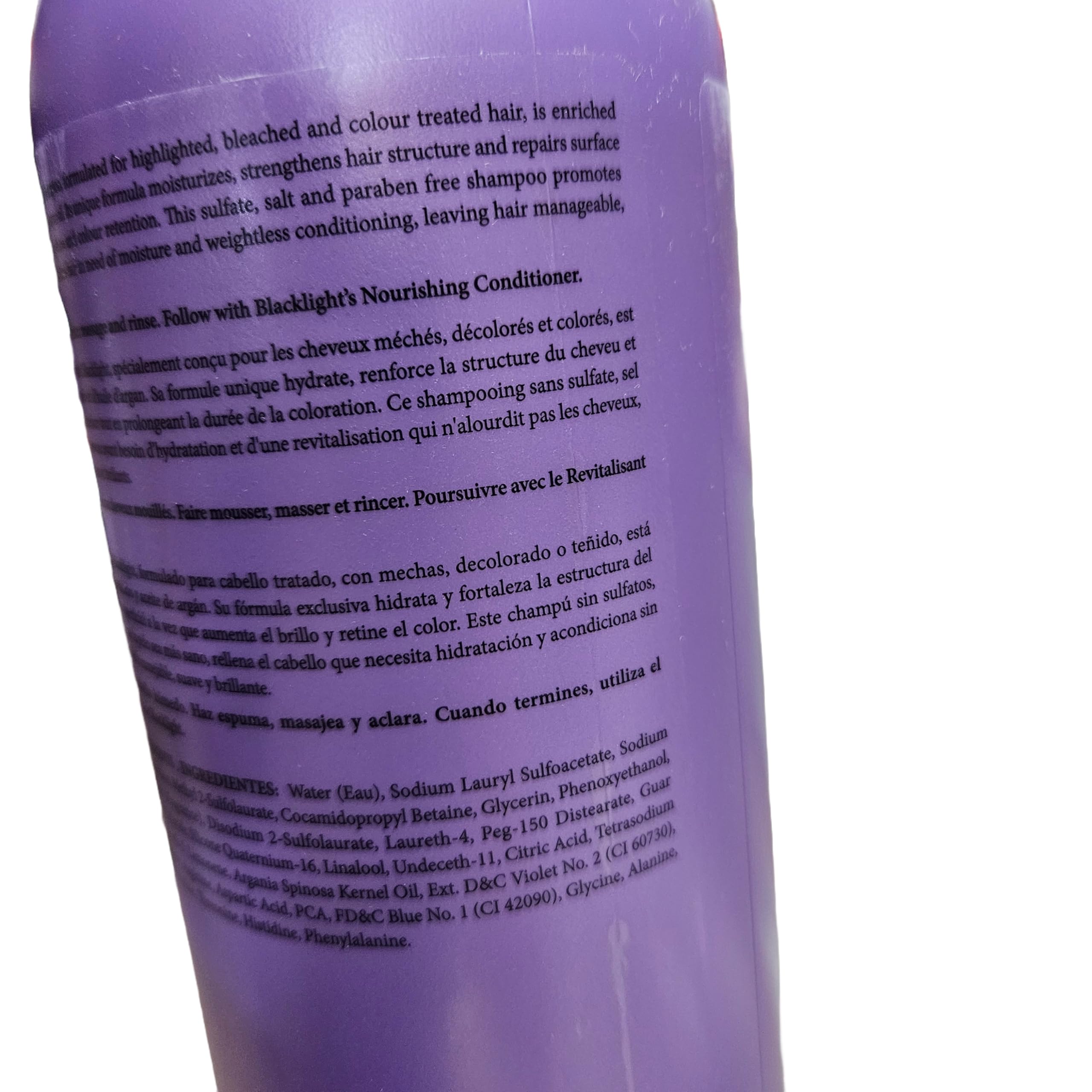 Oligo Professionnel Blacklight shampoo foamy-lather captured during wash.