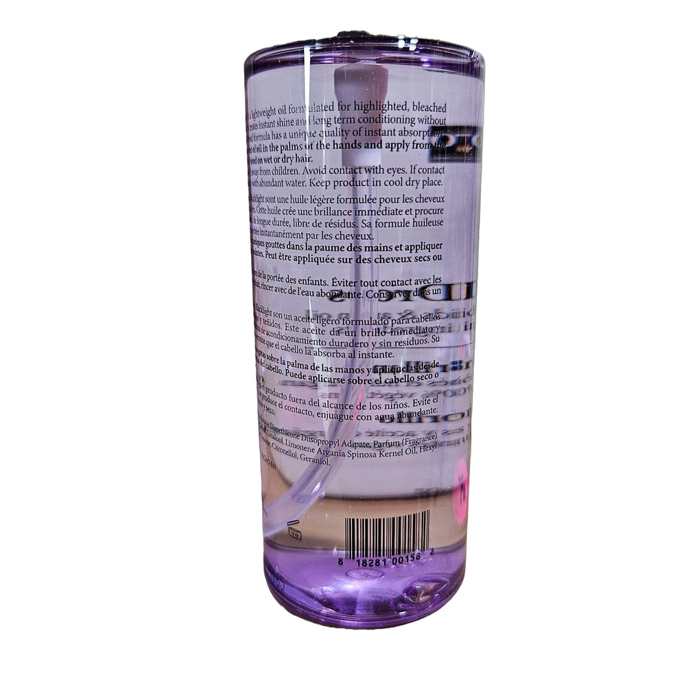 Oligo Professionnel Blacklight Shine Drops color-treated-hair-application shows protective mist for vibrant color.