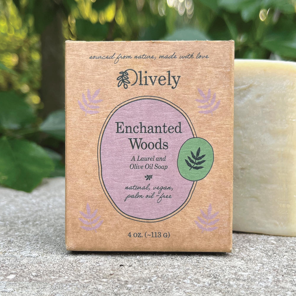 Olively Enchanted Woods soap packaging showcases natural ingredients and vegan formula.