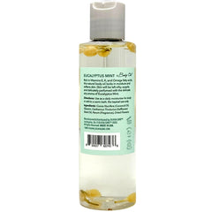 Olivia Care Body Oil pour nozzle showing smooth, quick-absorbing hydration.