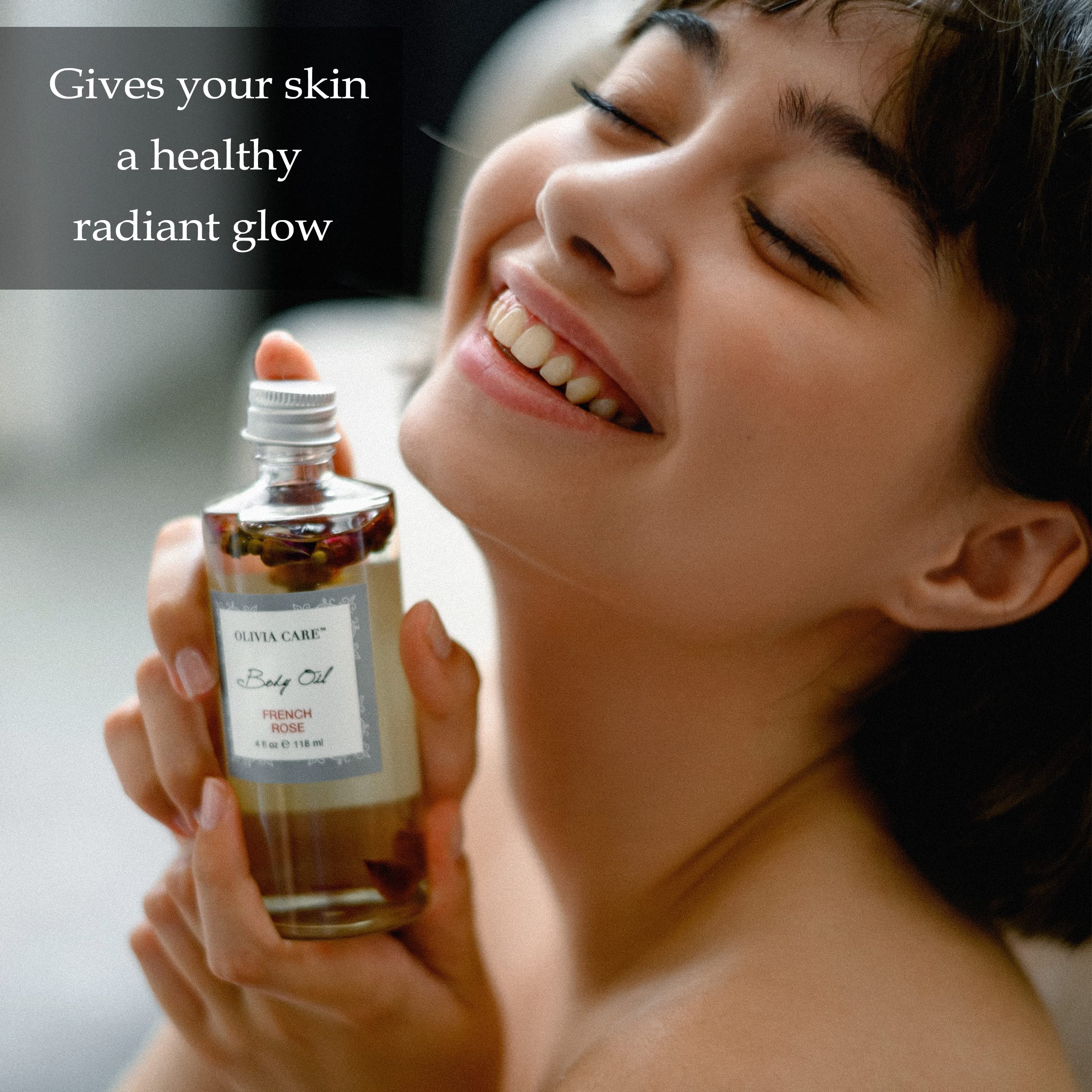 Olivia Care Body Oil texture being absorbed into skin for lasting moisture.