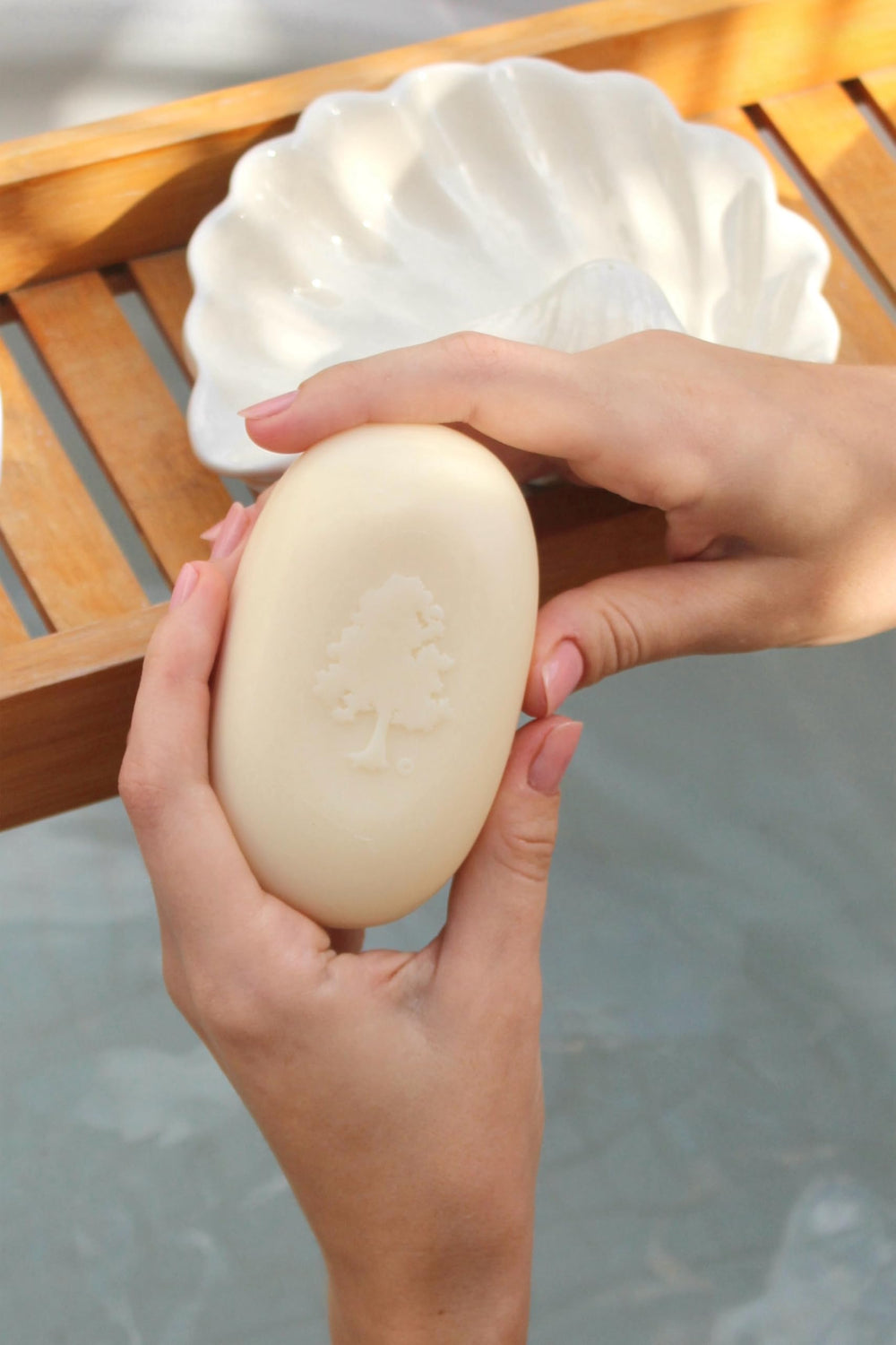 Olivia Care Lavender Bar Soap closeup showing olive oil infusion for moisturized skin.