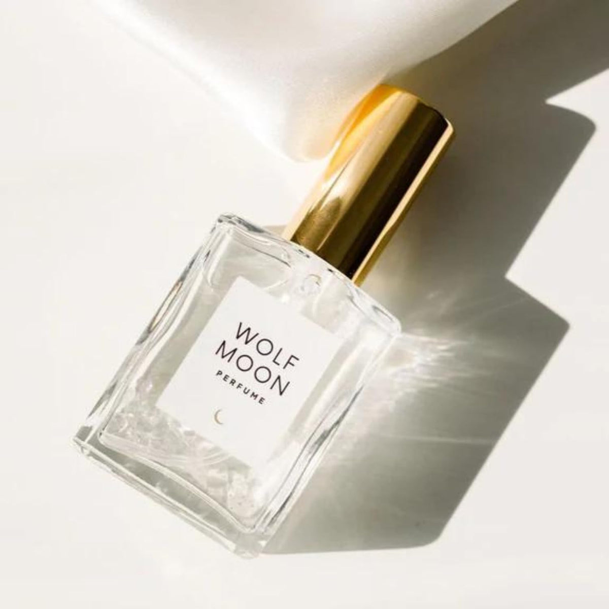 Olivine Atelier Wolf Moon perfume oil bottle with amber-vanilla aroma for long-lasting fragrance
