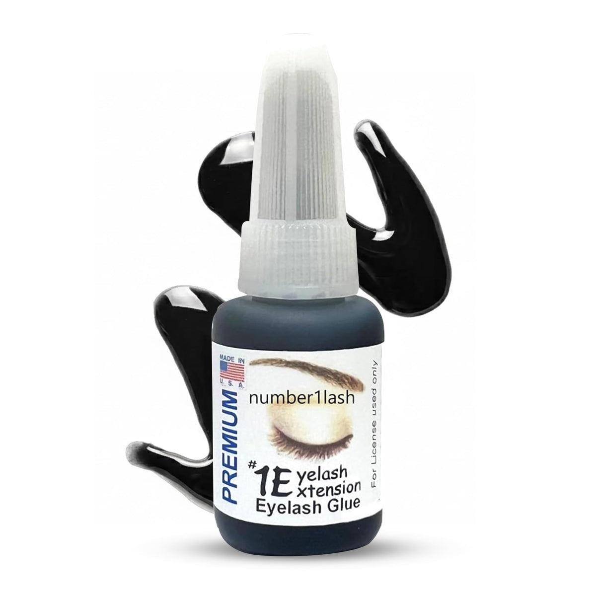 One Eyelash Extension premium adhesive bottle pour showing precise flow for lash placement