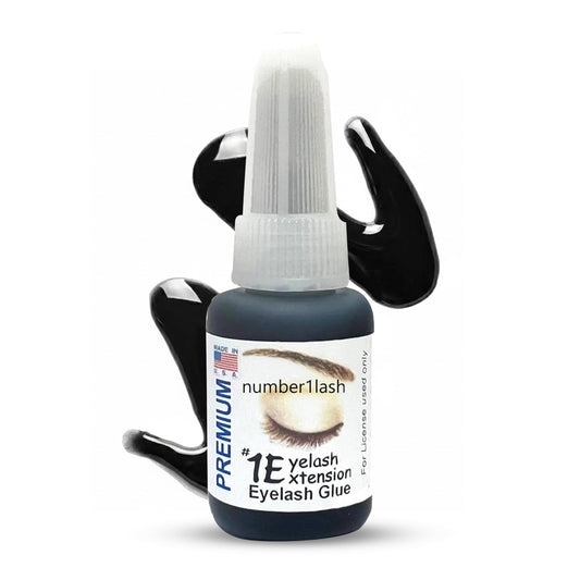 One Eyelash Extension premium adhesive bottle pour showing precise flow for lash placement