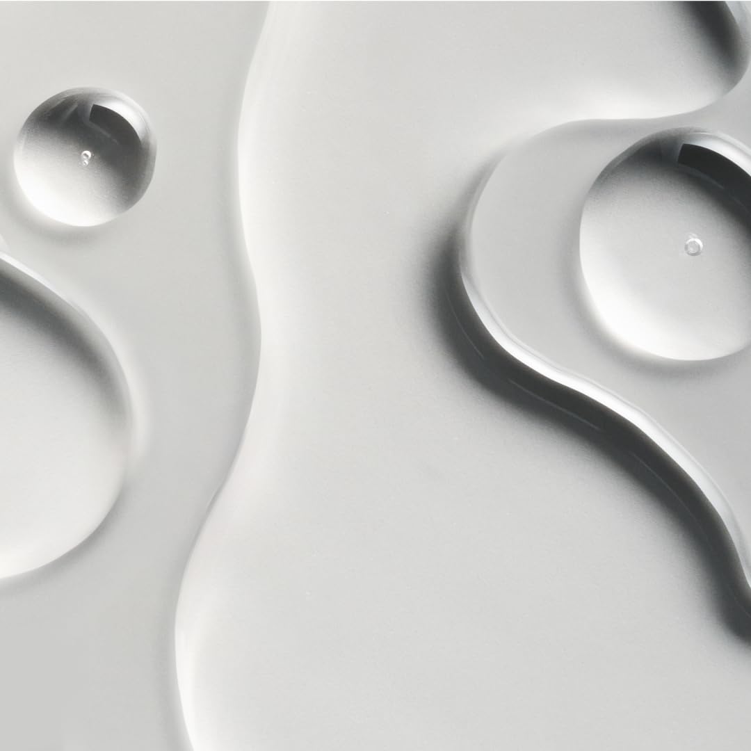 oneskin HAIR OS-01 peptide serum drop illustrating precise scalp application