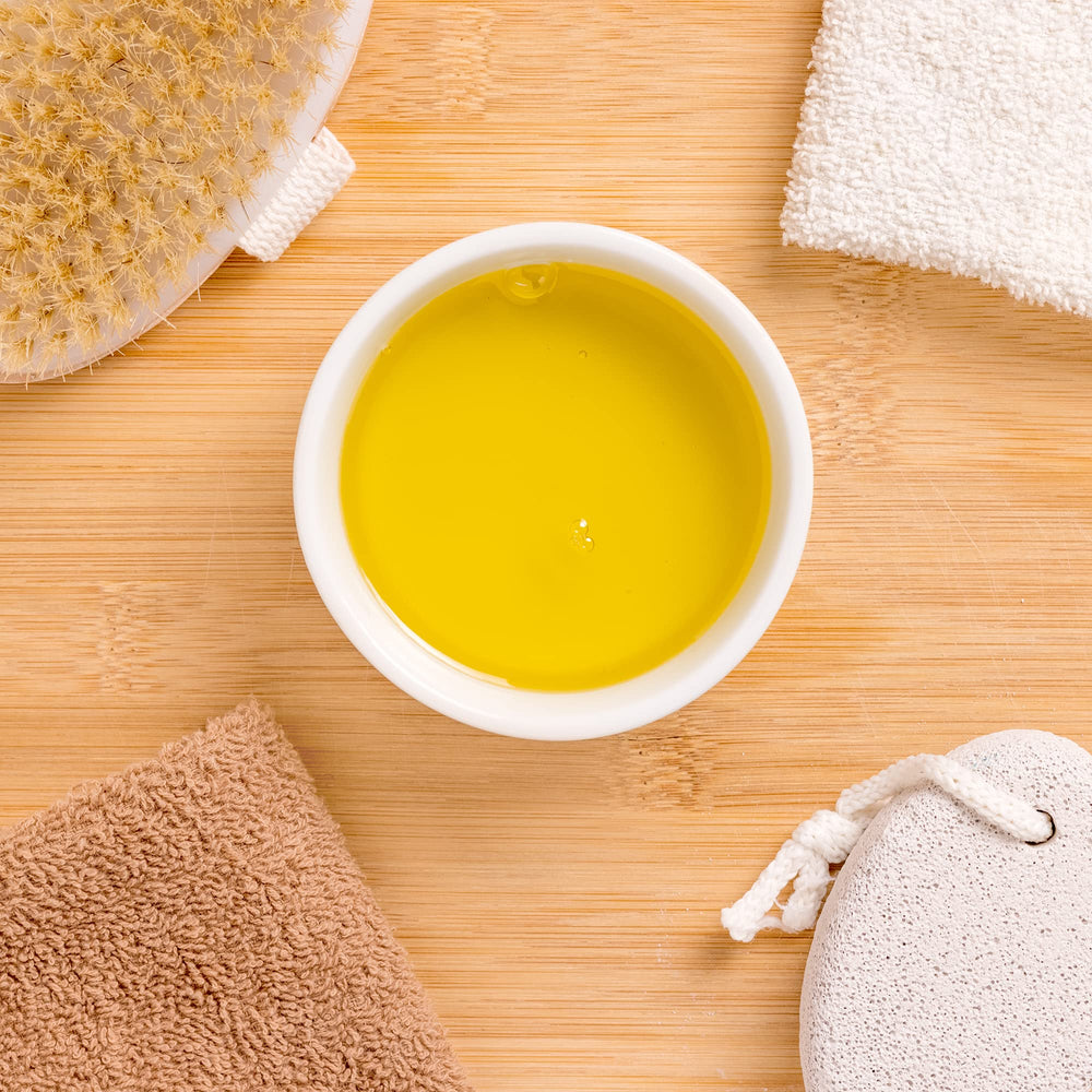 Ora's Amazing Herbal dusting powder container ready to refresh moisture-prone zones.