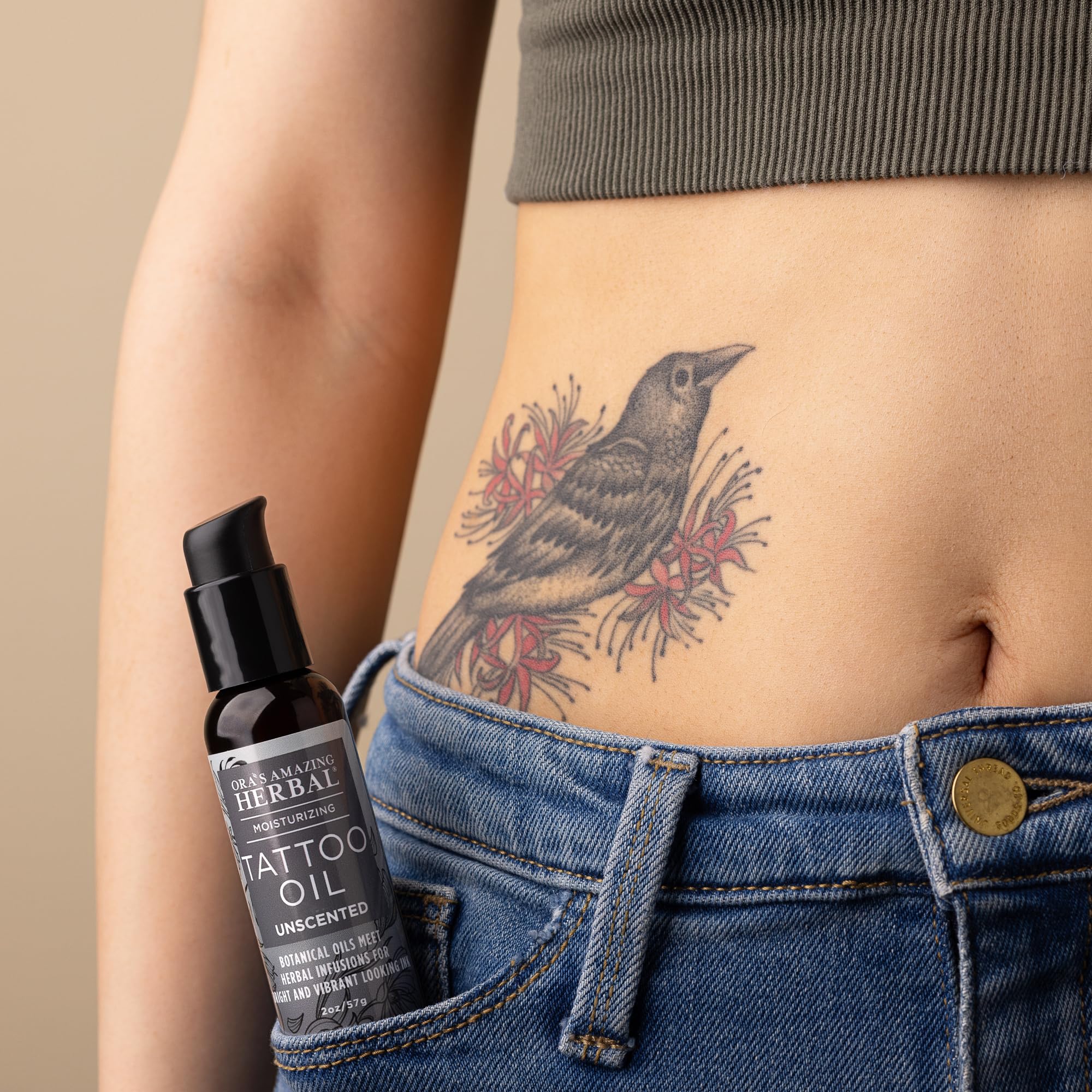 Ora's Amazing Herbal unscented tattoo oil close-up texture demonstrating absorption.