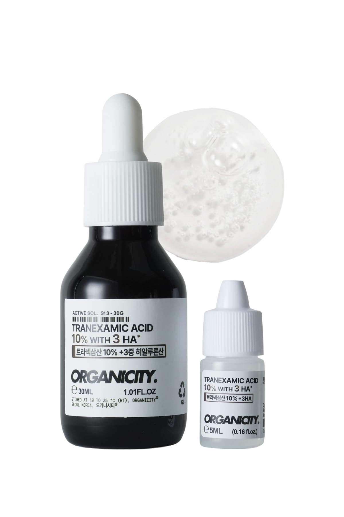 Organicity tranexamic acid ten-percent serum bottle close-up targets dark spots for even tone