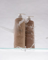 ORI LAB Curl Cleanse bottle back label showing organic ingredients and vegan formulation
