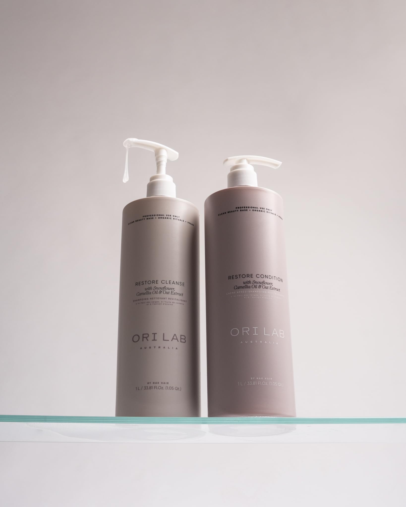 ORI LAB Restore Cleanse bottle close-up label, highlighting vegan, sulfate-free formulation.