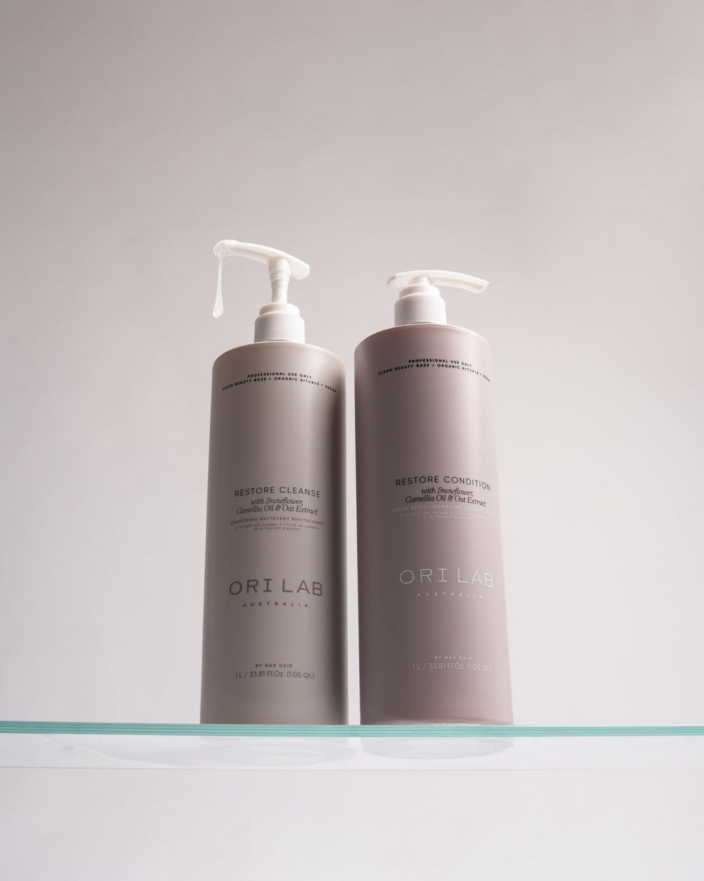 ORI LAB Restore Cleanse bottle close-up label, highlighting vegan, sulfate-free formulation.