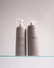 ORI LAB Restore Cleanse bottle close-up label, highlighting vegan, sulfate-free formulation.