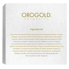 Application shot of Orogold overnight cream smoothing onto skin.