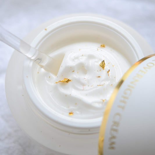 Orogold night cream texture swatch showing velvety finish for easy absorption.