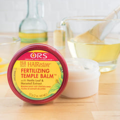 ORS Fertilizing Temple Balm texture swirl showing creamy consistency