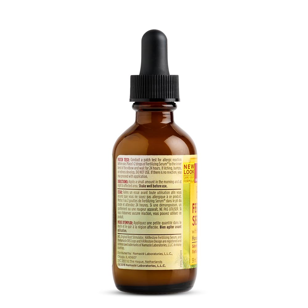 ORS Hairrestore Serum being applied to scalp during routine care