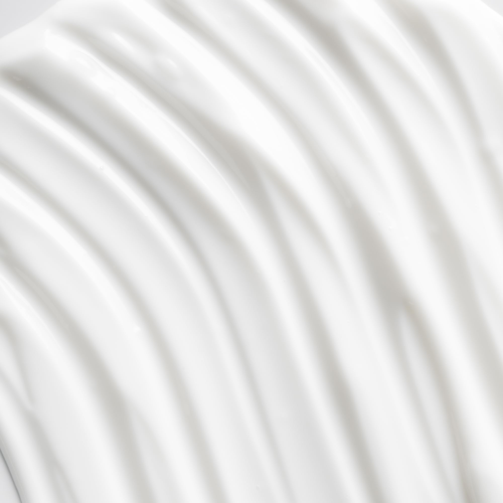Applying OSEA Advanced Protection Face Cream on the hand demonstrates quick absorption.