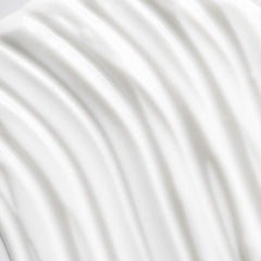 Applying OSEA Advanced Protection Face Cream on the hand demonstrates quick absorption.