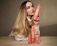 OSiS+ Upload Volume Cream texture close-up reveals creamy consistency.