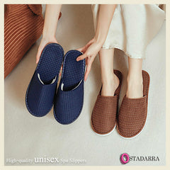 OSTADARRA spa slippers with polar fleece material for soft comfort and warmth.