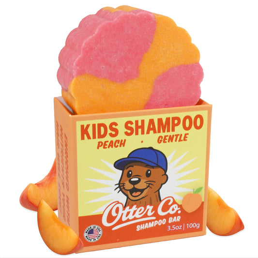 Otter Co Kids Gentle Peach Shampoo Bar close-up, creamy texture and peach scent.