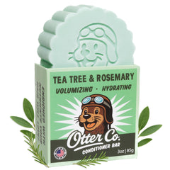 Otter Co Tea Tree & Rosemary conditioner bar packaging shows biodegradable materials for zero-waste hair care.