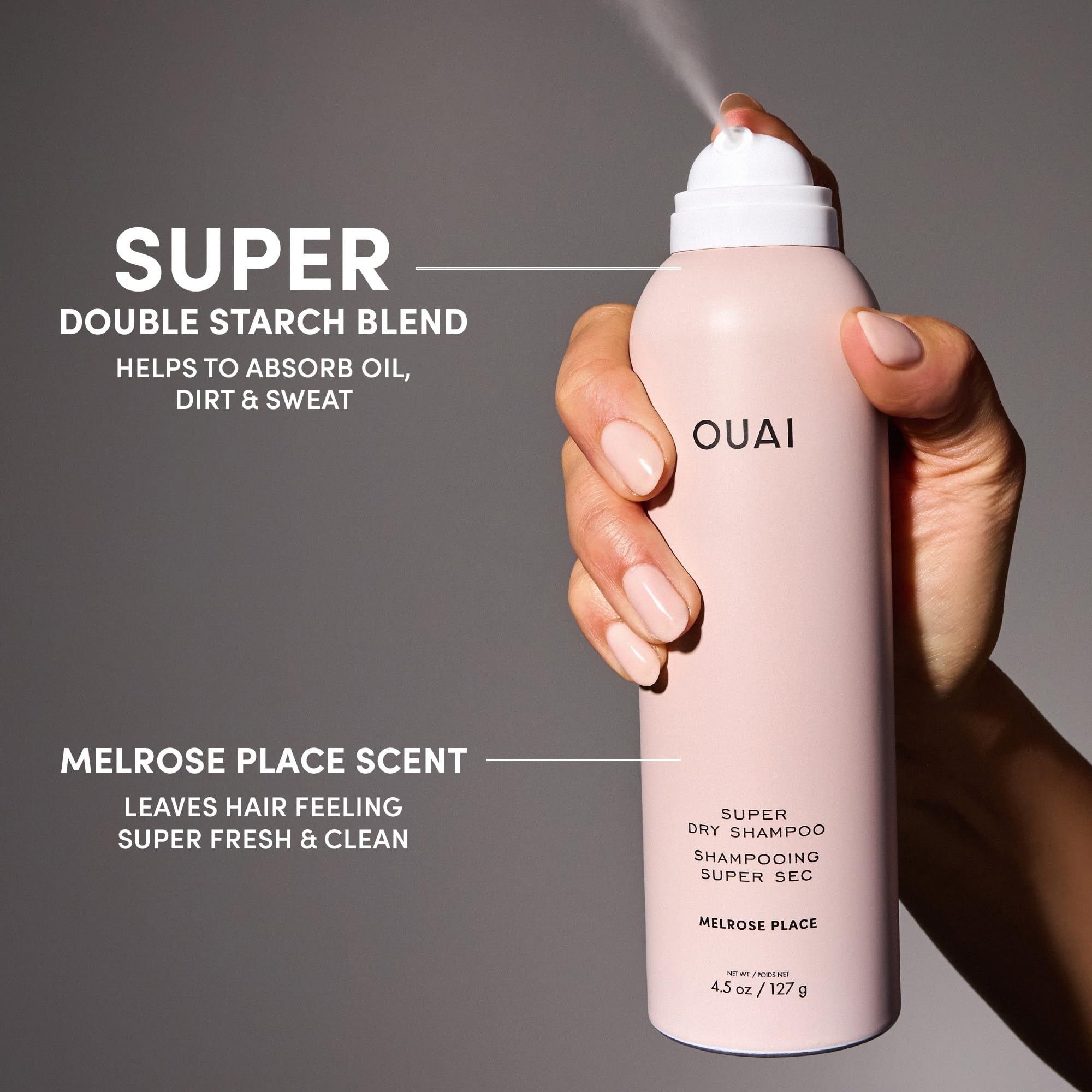 OUAI bottle and hands applying product for a quick refresh.