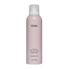 OUAI Super Dry Shampoo bottle pour showing oil absorption for between-wash refresh.