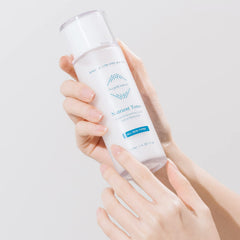 OxygenCeuticals Nutrient Toner bottle close-up emphasizes refreshing lightweight feel.