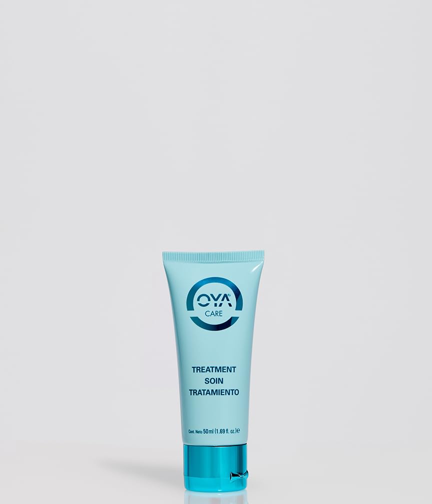 OYA Treatment hair mask being applied for silky, manageable strands.