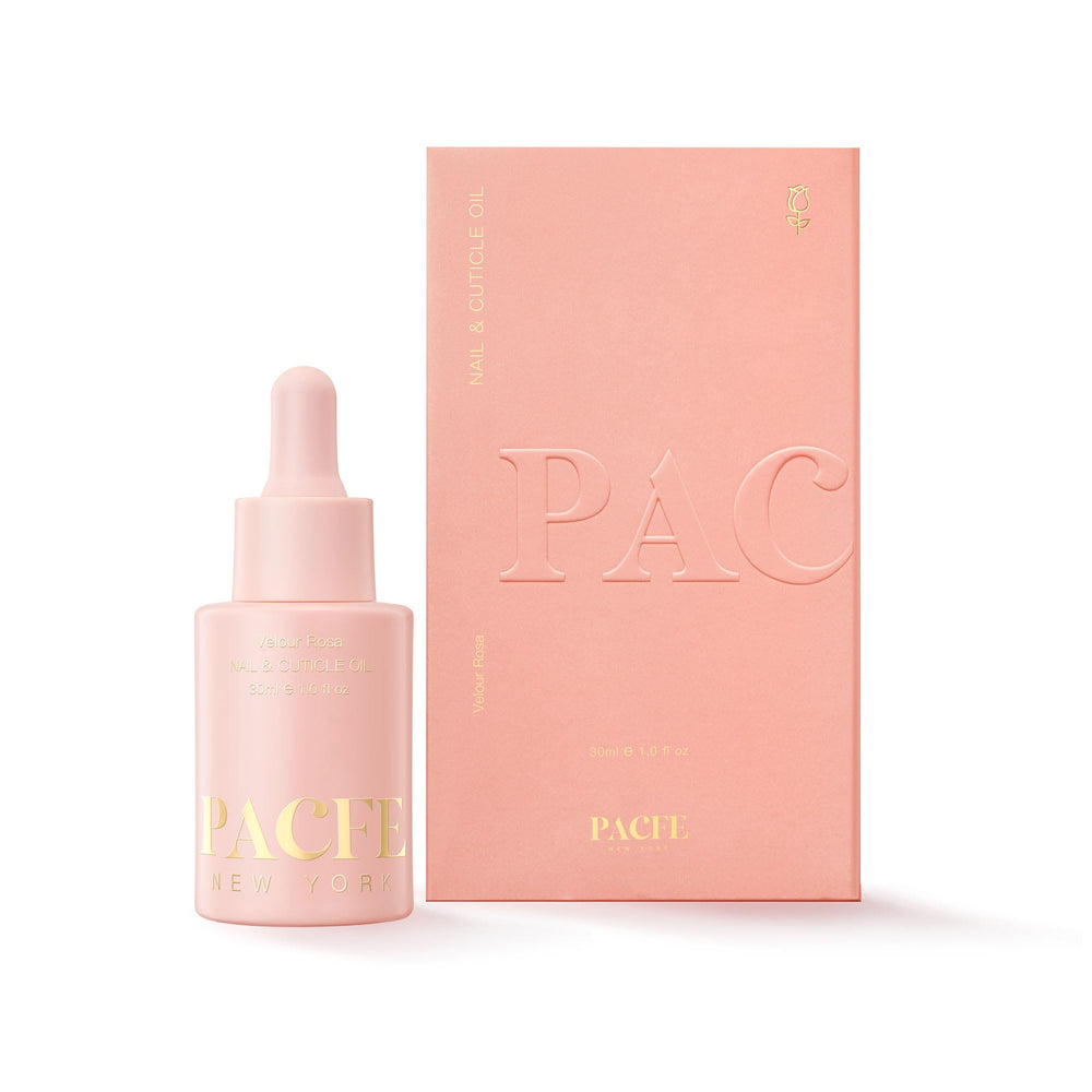 Pacfe cuticle oil bottle on a clean surface, promoting hydrated cuticles.