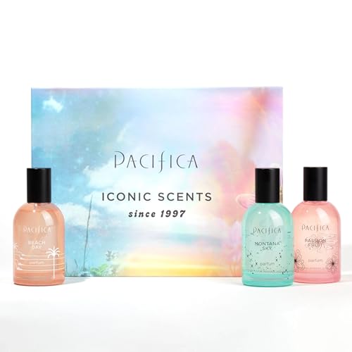 Pacifica Beach Day bottle beside driftwood, evoking breezy coastal vibes.