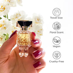 Paco Rabanne Fame mini held in hand, showcasing portable luxury for daily routines.