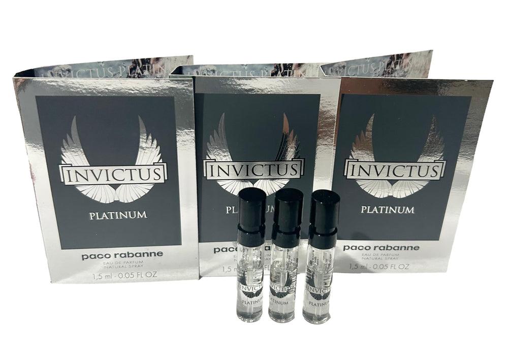 Spraying Invictus Platinum for lasting daytime freshness.