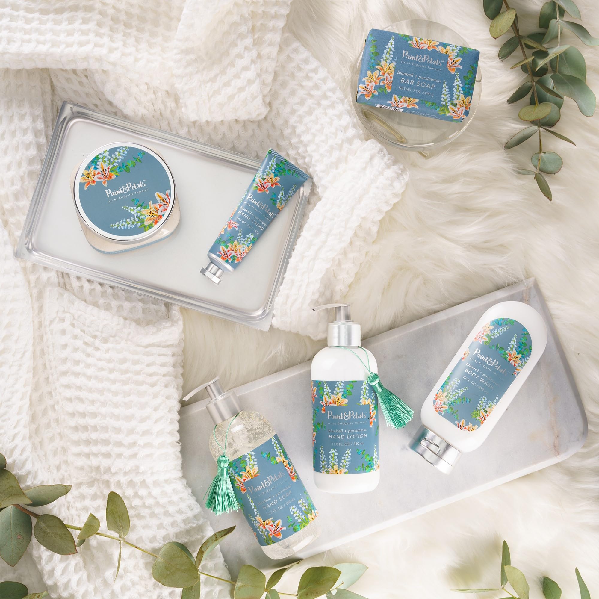 PAINT & PETALS Bluebell Persimmon lotion on sink shows easy, everyday use