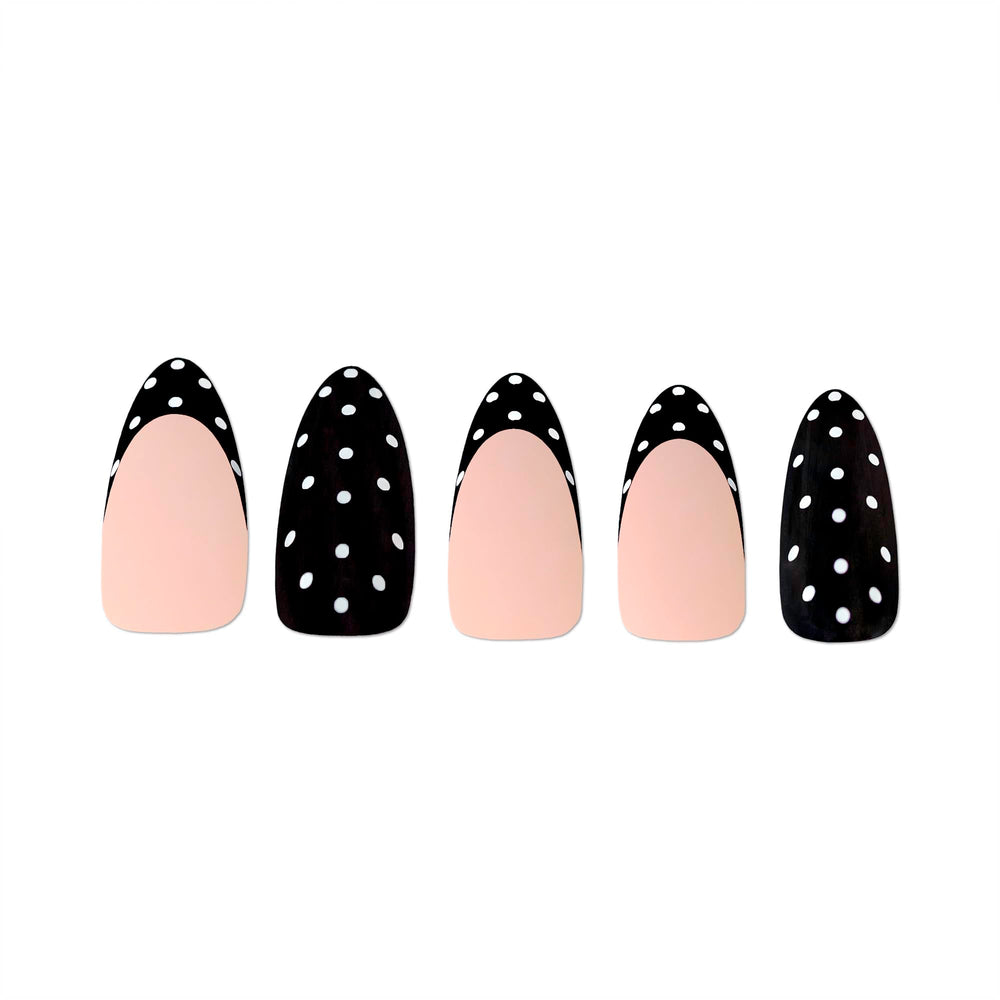 PaintLab Polka Dot Couture nails with glue in use for quick at-home styling