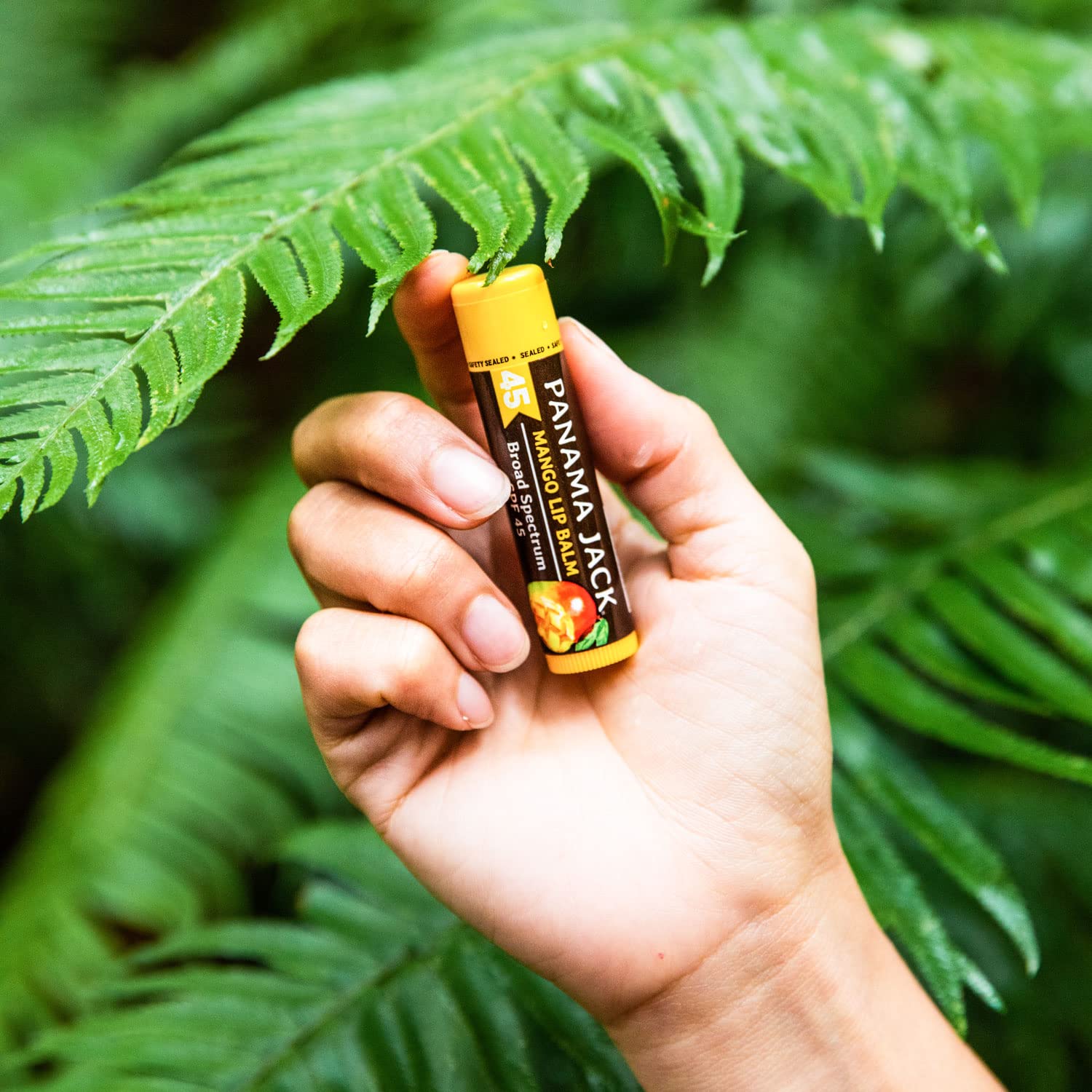 Dreamsicle flavor Panama Jack lip balm tube ready for outdoor use.