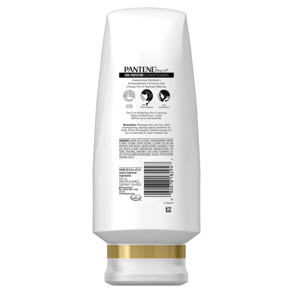 Close-up of Pantene Pro-V label emphasizing frizz-control features.