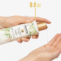 Diverse models use Pantene bamboo shampoo in a bathroom setting to show versatility.