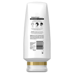 Close-up of Pantene Pro-V Radiant Color Shine conditioner dispensing pump for even application.