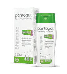 Pantovigar Growth Shampoo bottle being poured for easy daily use and hair support.