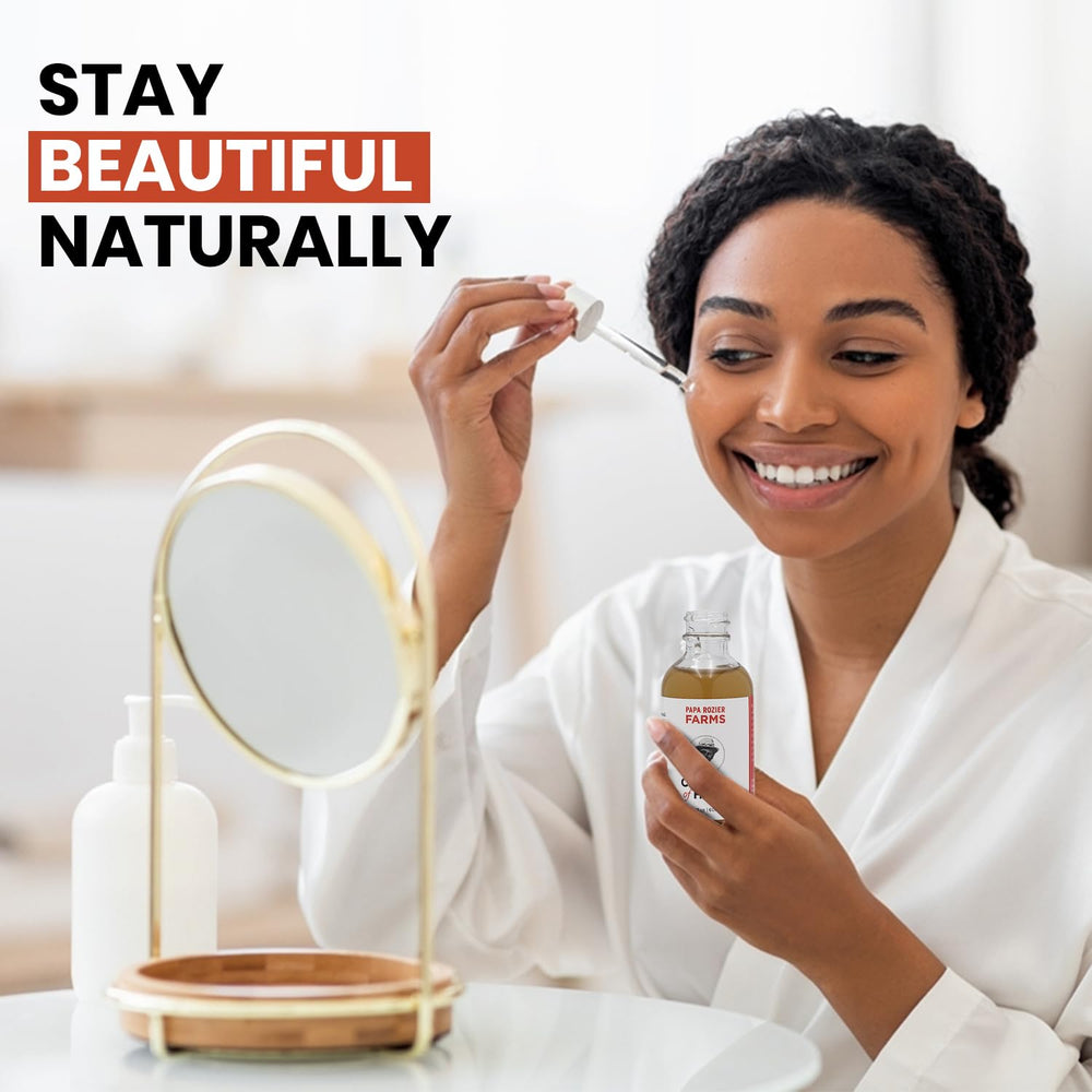 Papa Rozier Farms moringa oil blend bottle for nourishing hair care.