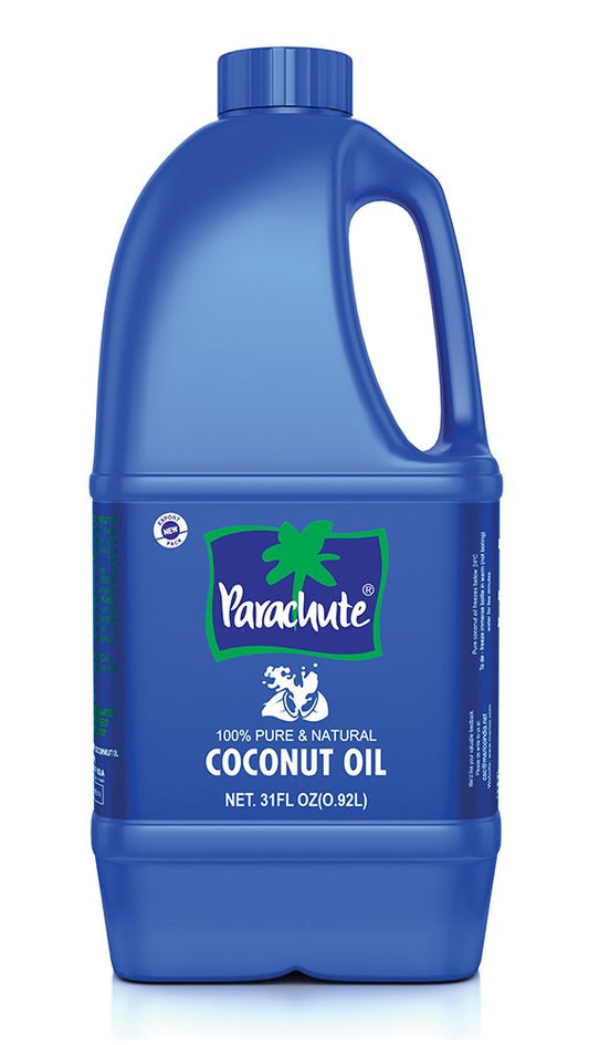 Parachute coconut oil bottle pour showing versatile kitchen and skin care use