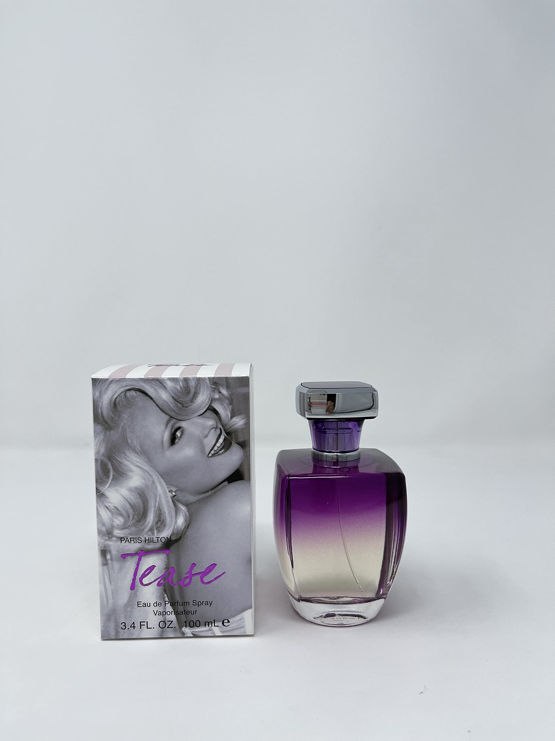 Paris Hilton Tease spray action captures effortless application for daily confidence.