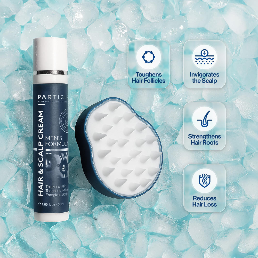Particle scalp massager in hand delivering even cream distribution