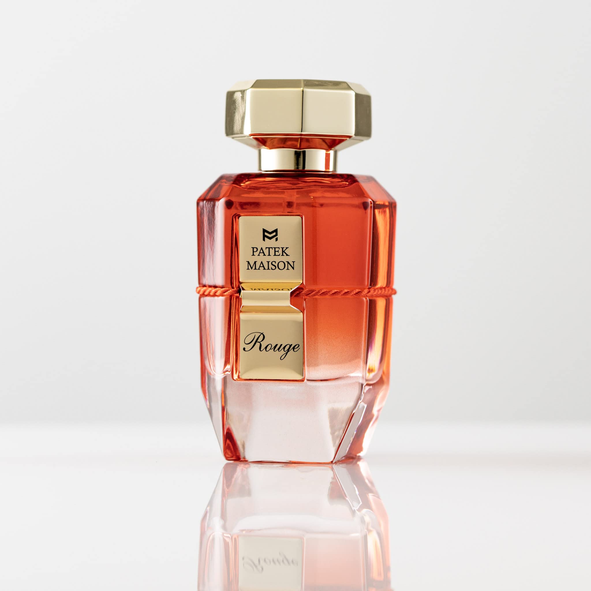 Patek Maison Prisme Rouge heart notes close-up highlights creamy sweetness.