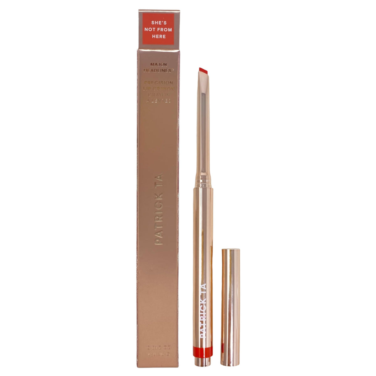 Patrick Ta Major Headlines lip crayon in She's Not From Here swatch for bold orange-red lips.