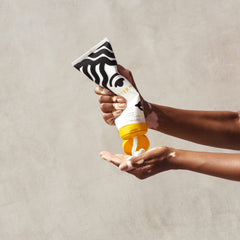 PATTERN Heavy Conditioner creamy cream texture close-up emphasizes luxurious conditioning.